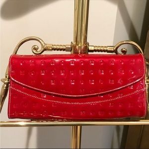 Arcadia Italy red clutch